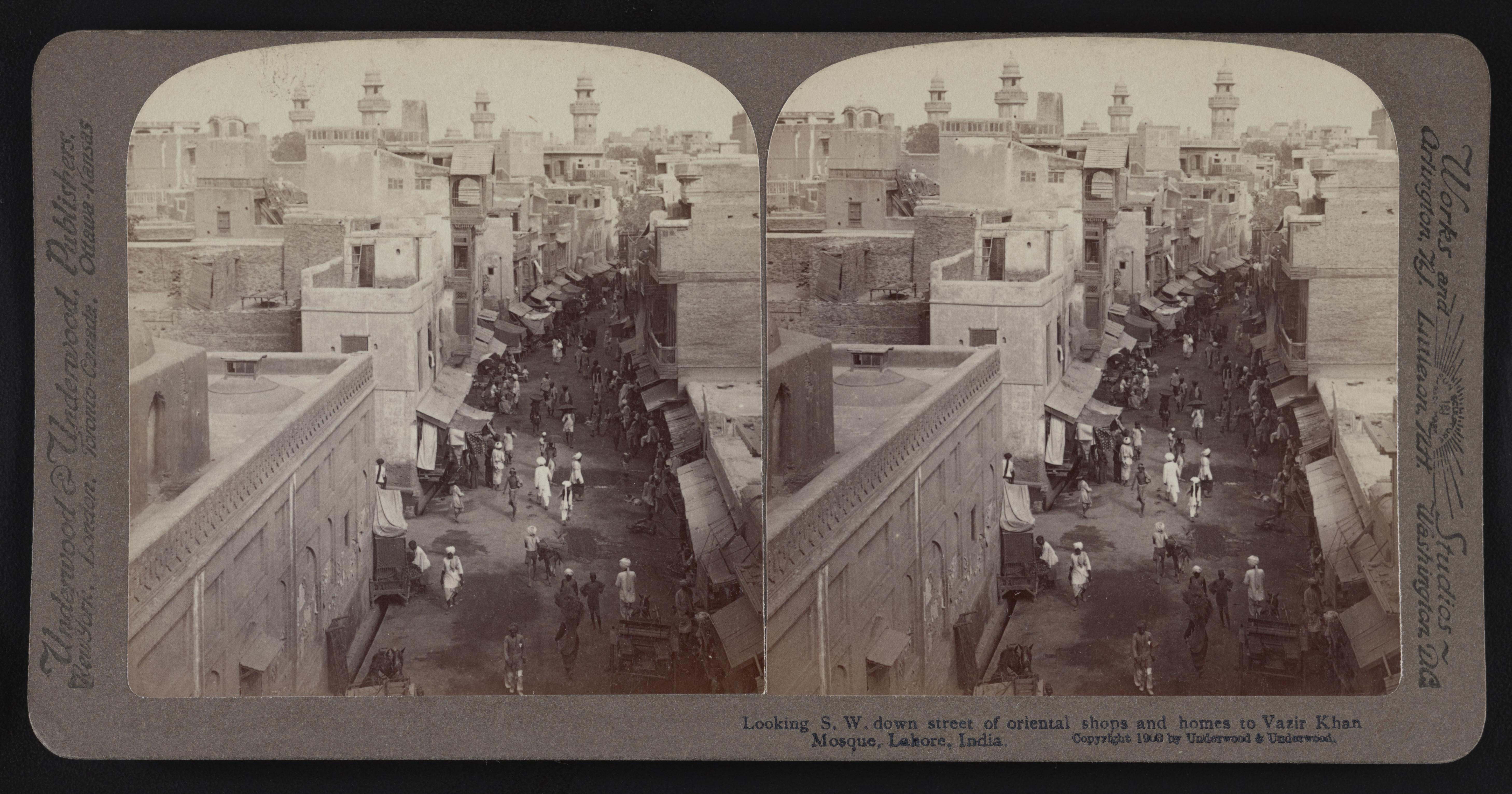 Looking s.w. down street of oriental shops and homes to Vazir Khan Masjid, Lahore, India
