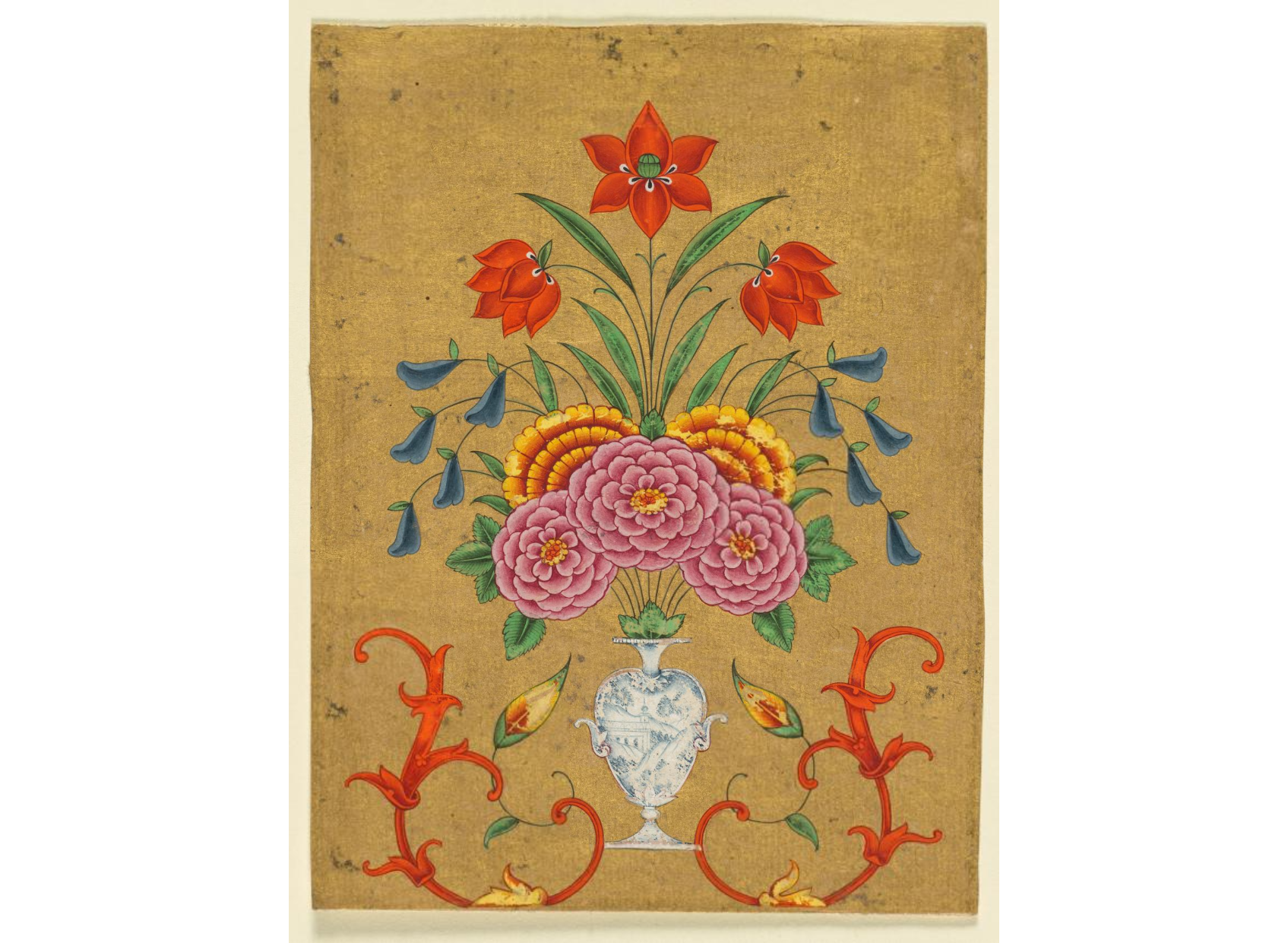 Vase with flower arrangement and scrollwork