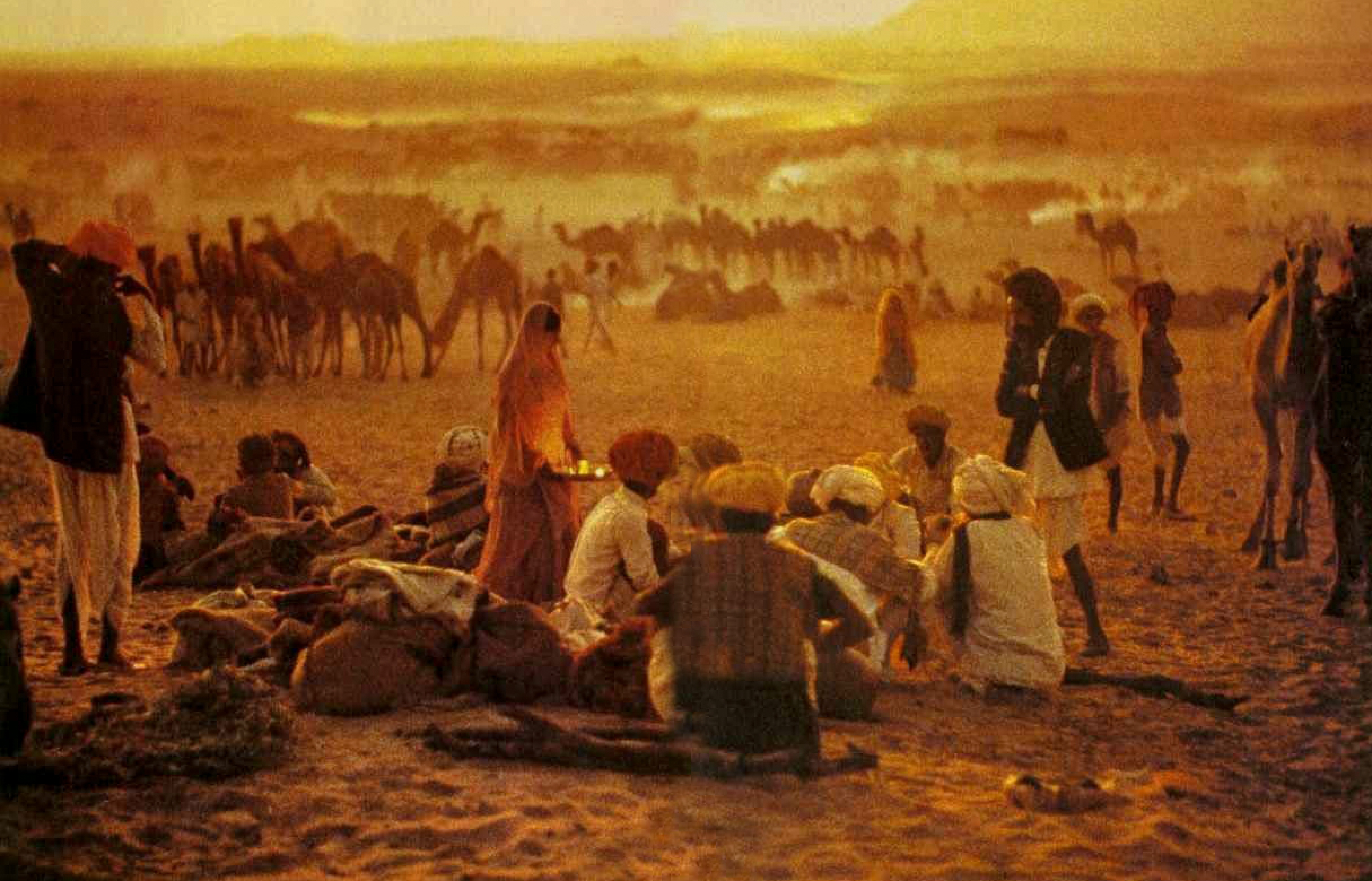 Hubbub Softens  to  a  Hazy  Murmur as Camel Traders Prepare to bed Down at Pushkar in Rajasthan, in a scene little Changed Since Moghul times