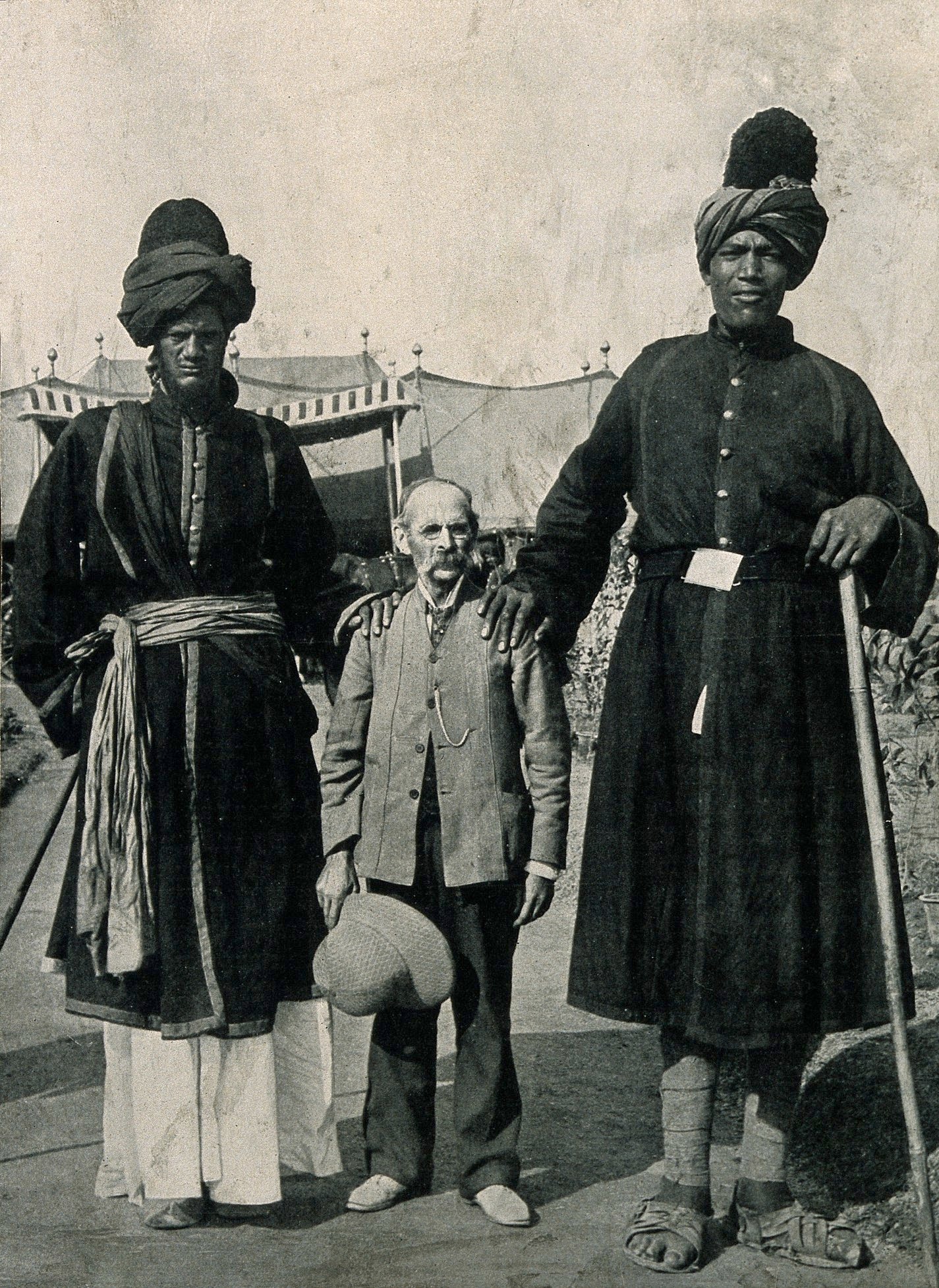 Professor Ricalton with two giants of India at the Delhi Durbar of 1903