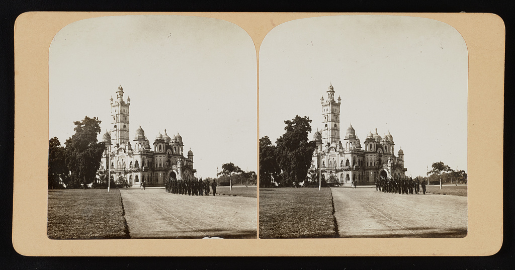 Group of people in front of building, Baroda, India