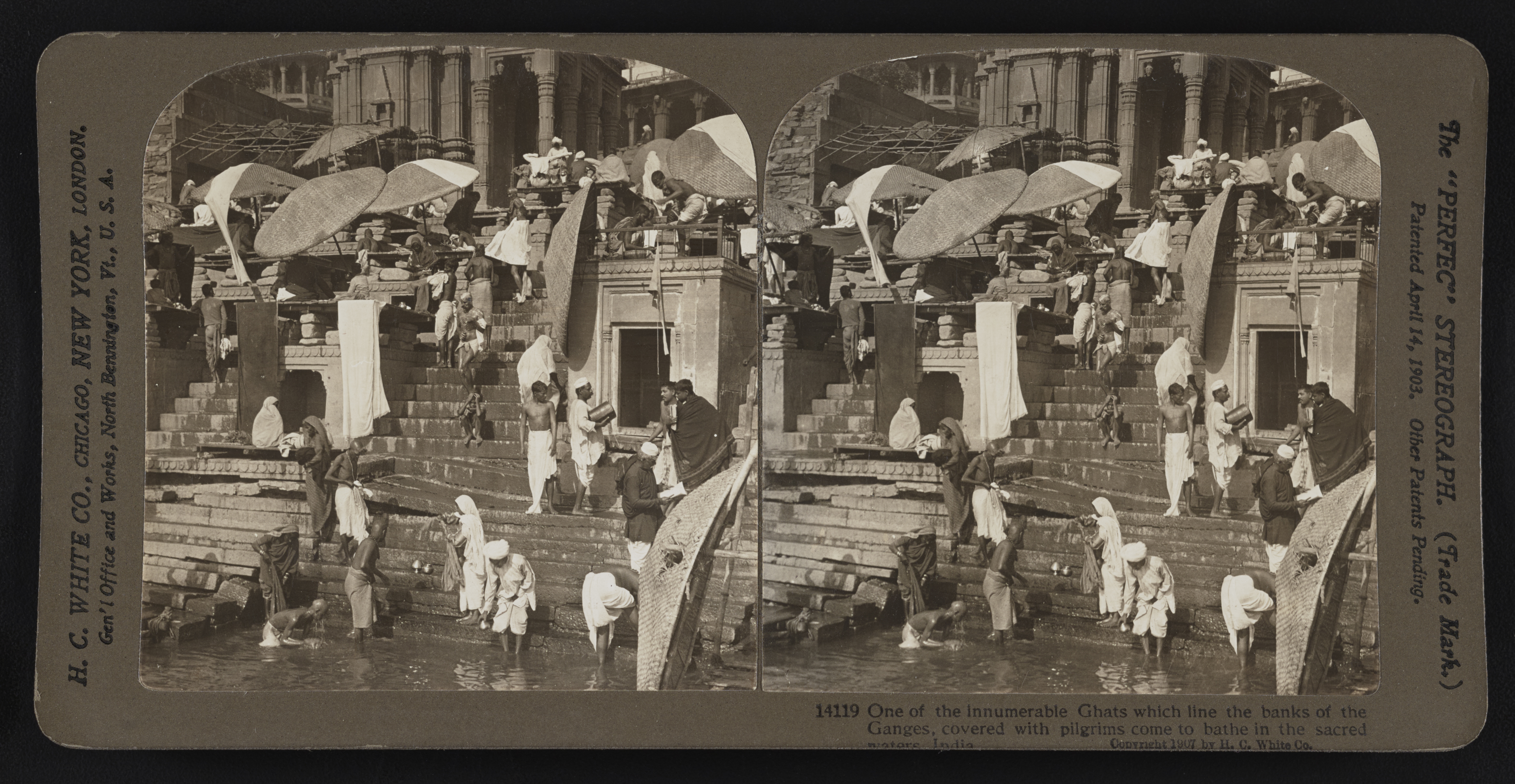 One of the innumerable Ghats which line the banks of the Ganges, covered with pilgrims come to bathe in the sacred waters, India