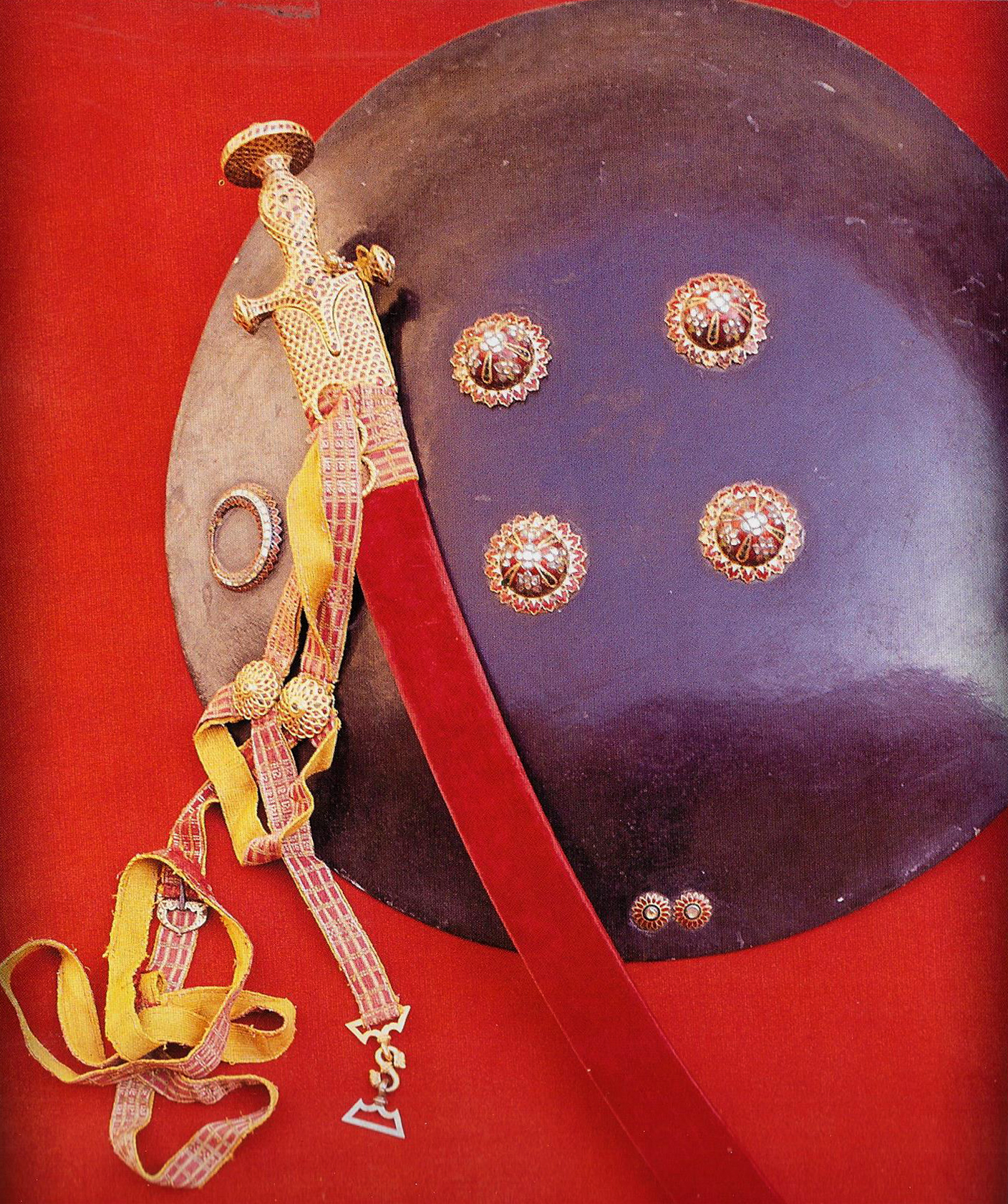 The shield made of rhinoceros hide is lacquered in black