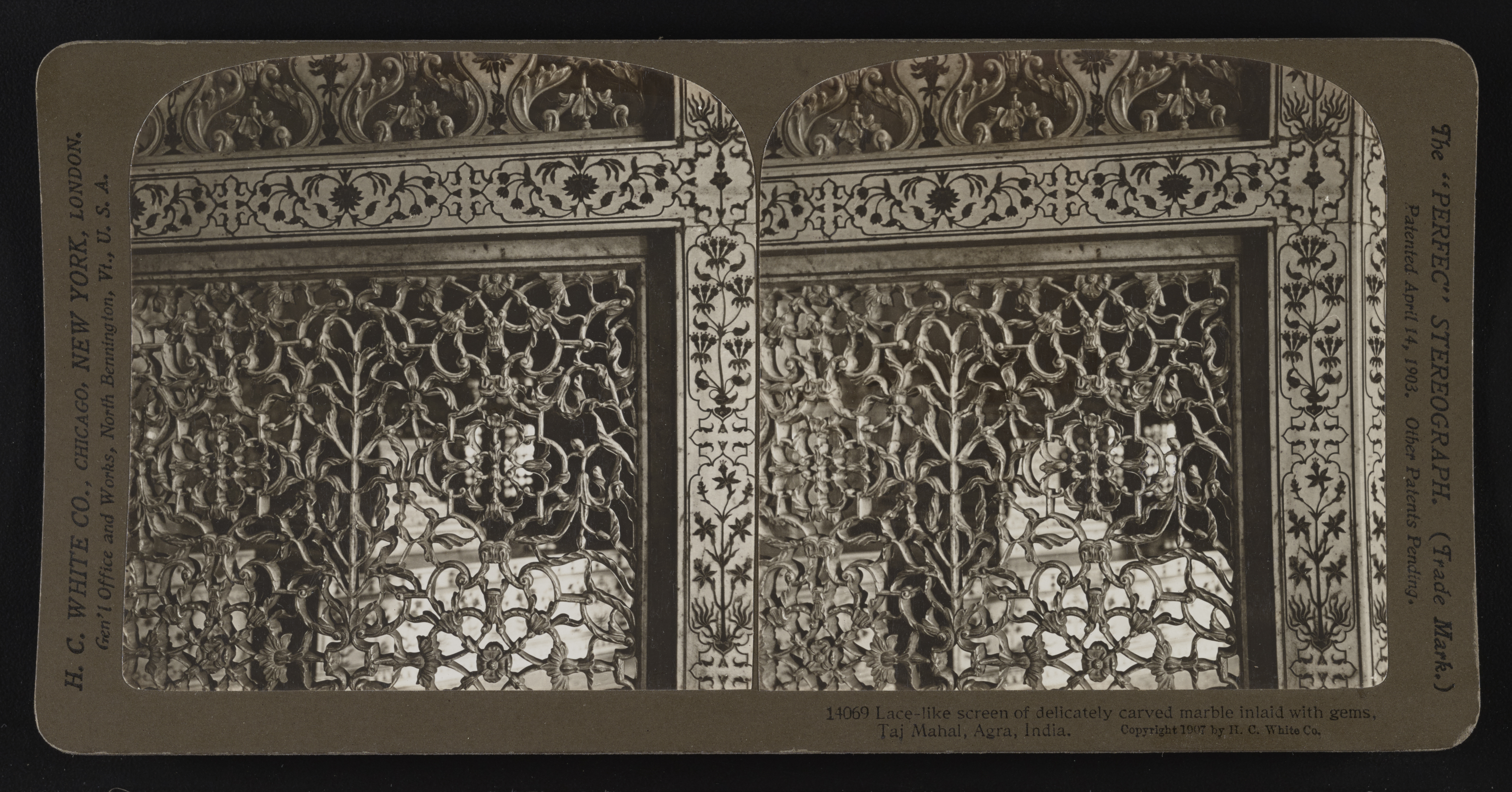 Lace-like screen of delicately carved marble inlaid with gems, Taj Mahal, Agra, India