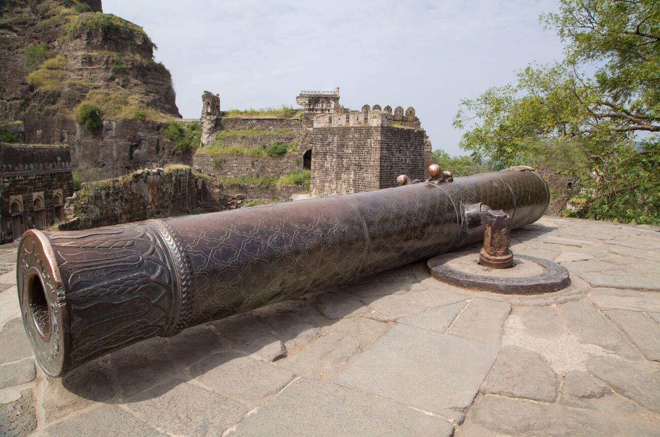 A five-metal, 6-metre cannon, engraved with Emperor Aurangzeb's name at Daulatabad Fort, Maharashtra